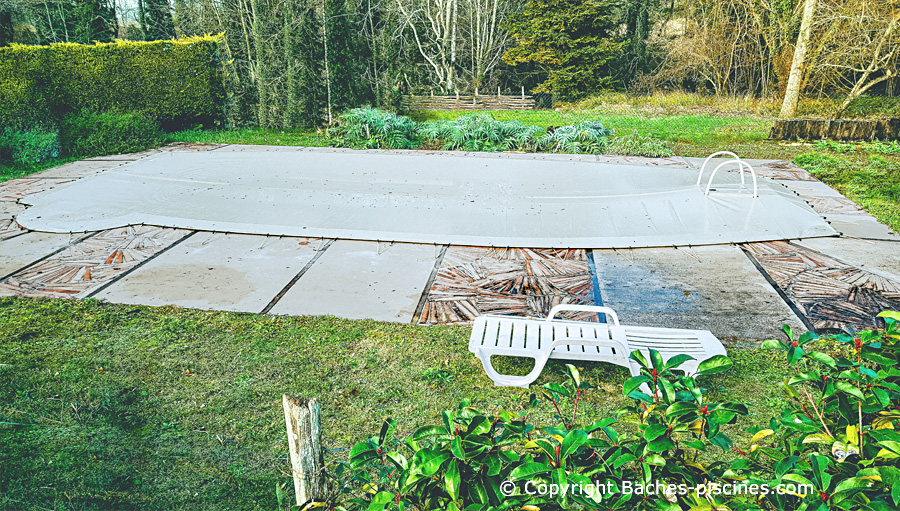 Installation bache hiver piscine